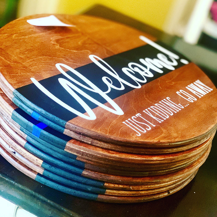 Stack of wooden door hangers