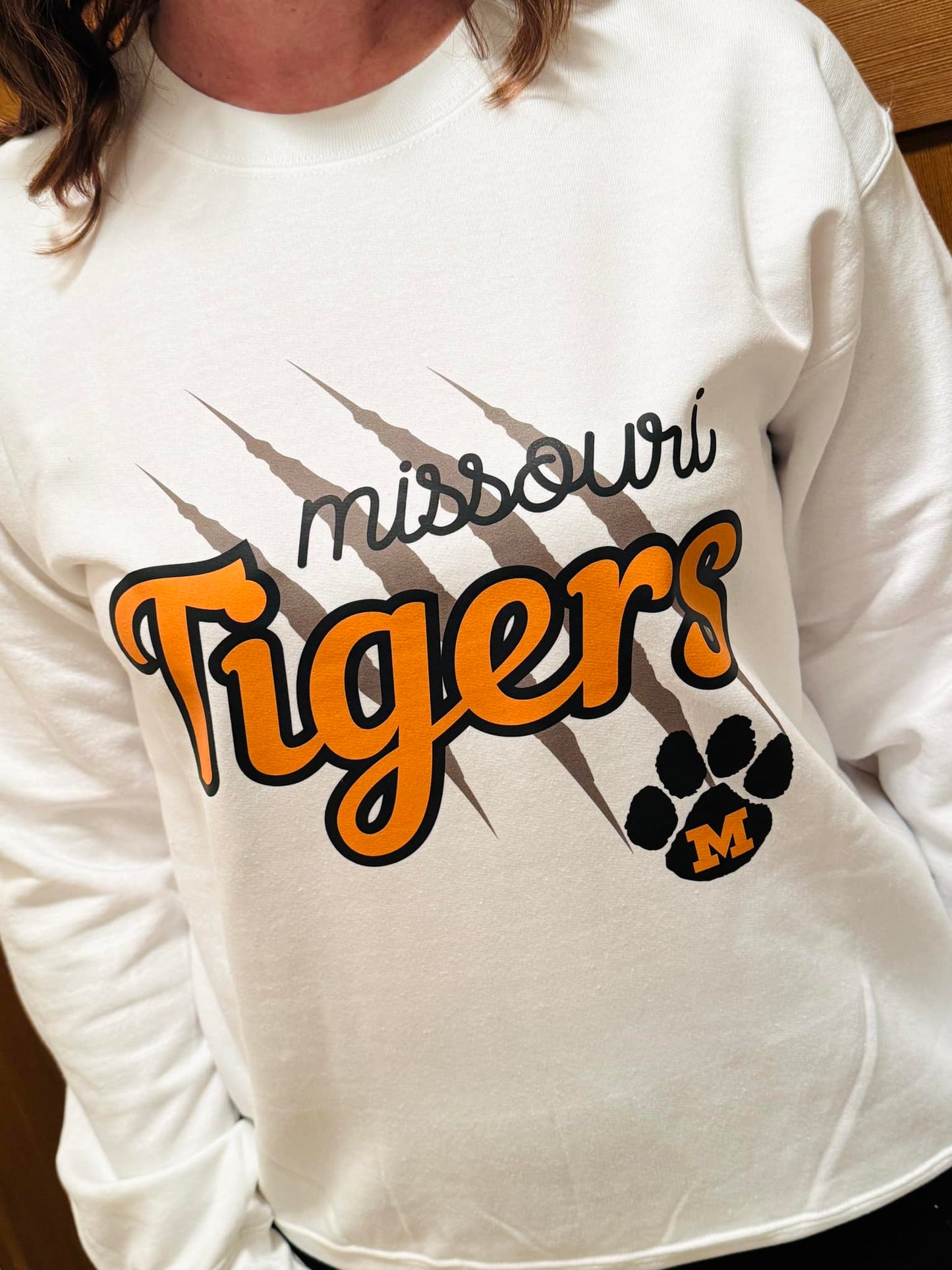 Missouri Tigers Scratch Sweatshirt in white worn by a woman.